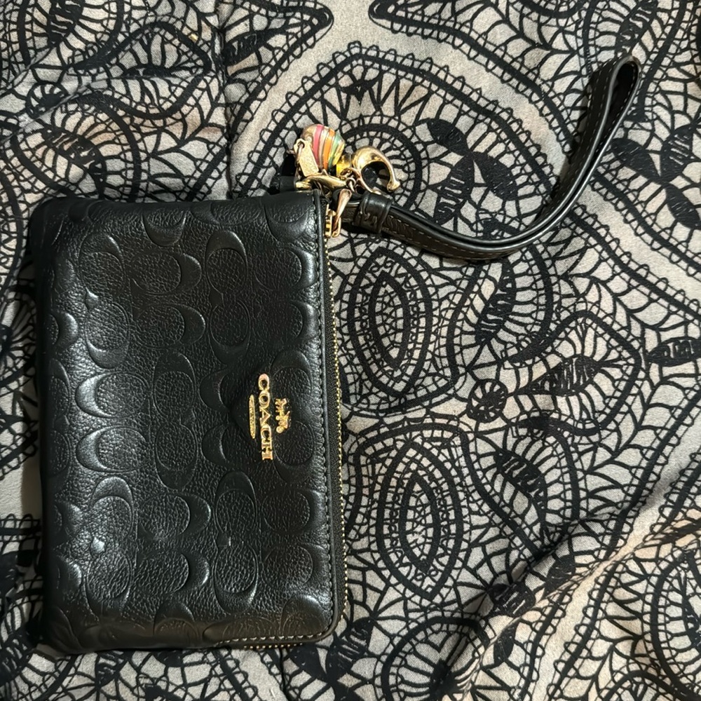 Coach wallet with charms